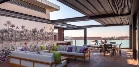 Come trasformare un balcone in una veranda senza abusi edilizi?